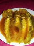 কমলার খোসা দিয়ে মাছ ভুনা।