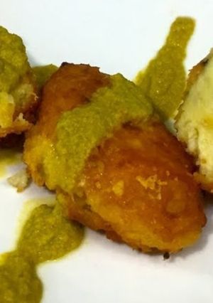 Una foto de Croquetas de papa bañadas en flor de calabaza