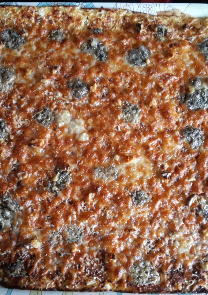 Una foto de Pizza de coliflor con tres quesos y nueces