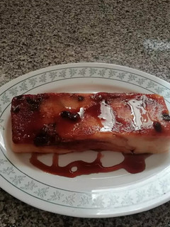 Una foto de Pudín con piña y pasas en el microondas