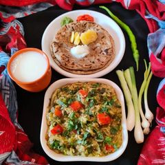 A picture of Green Spices Ringan no Olo with Jowar Bajra Roti - Kathiyawadi Dinner.