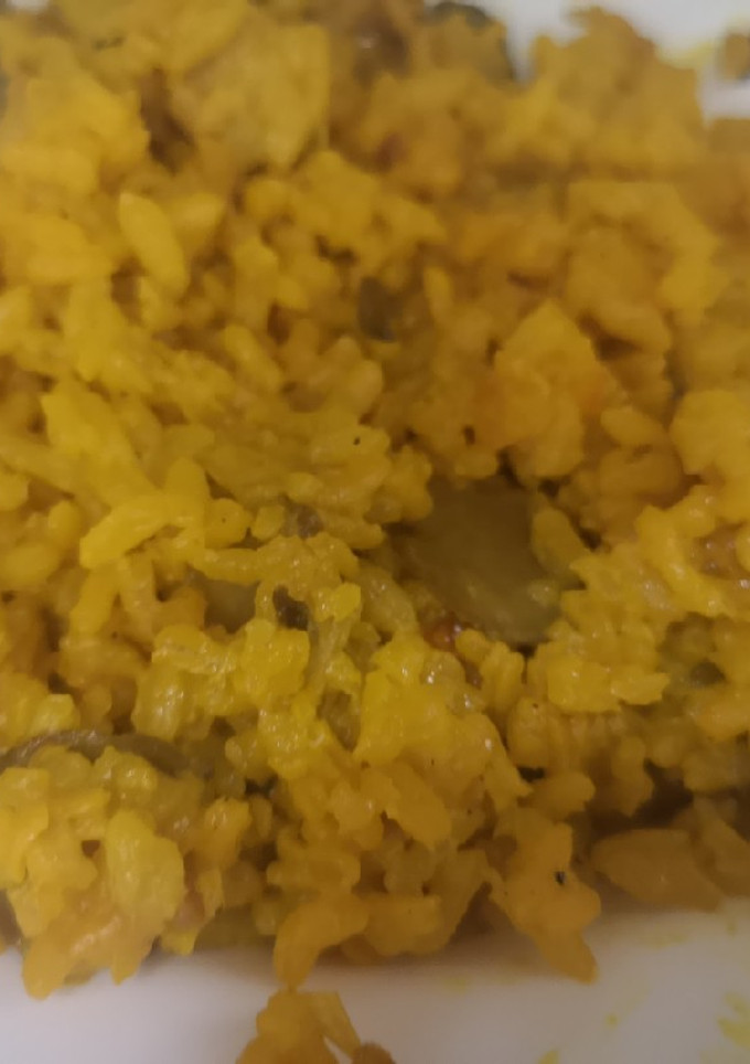 Una foto de Arroz con carne y champiñones