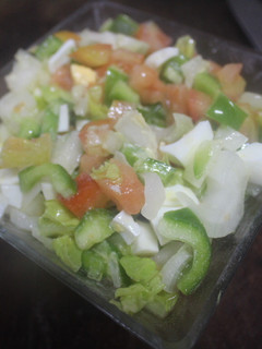 Una foto de Pico de gallo con pimiento de maceta