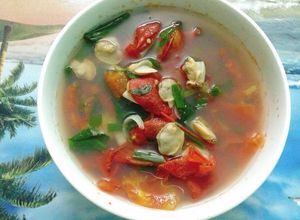 Hình của món Canh ngao nấu cà chua.