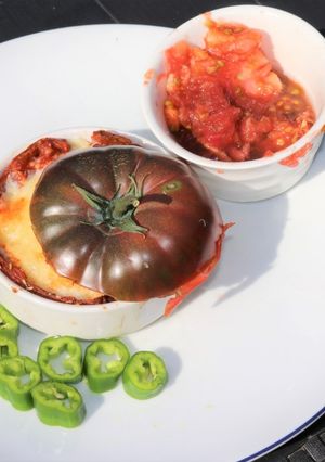 Une photo de Oeuf cocotte dans tomate