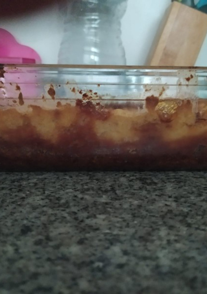 Una foto de Pudin de melocotón con base de caramelo y coco