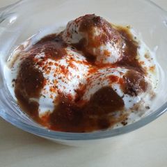 A picture of Dahi Vada using Appe Pan.