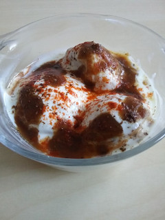A picture of Dahi Vada using Appe Pan.