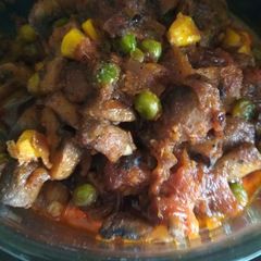 A picture of Mushroom baby corn stir fry.