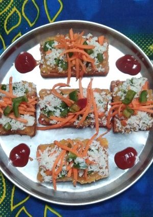 ટોસ્ટ પીઝા (Toast Pizza Recipe In Gujarati) રેસીપી મુખ્ય ફોટો
