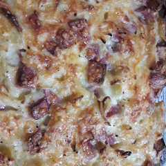 Una foto de Fideos gratinados con salsa blanca y mortadela