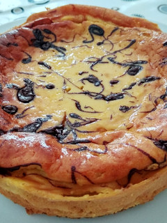 Una foto de Tarta de queso gallega con yogurt de licor café