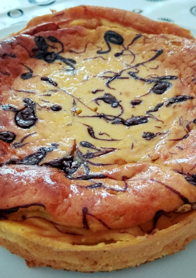 Una foto de Tarta de queso gallega con yogurt de licor café