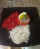 Tomates rellenos con puré de verduras y arroz