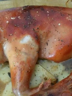 Una foto de Cochinillo al horno