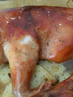 Una foto de Cochinillo al horno