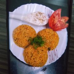 A picture of Spicy chilli tangy tomato rice.