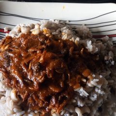 Rice and beans withCrayfish iru stew A picture of Rice and beans withCrayfish iru stew.
