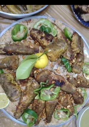 صورة لوصفة سمك مقلي مع رز مبهر