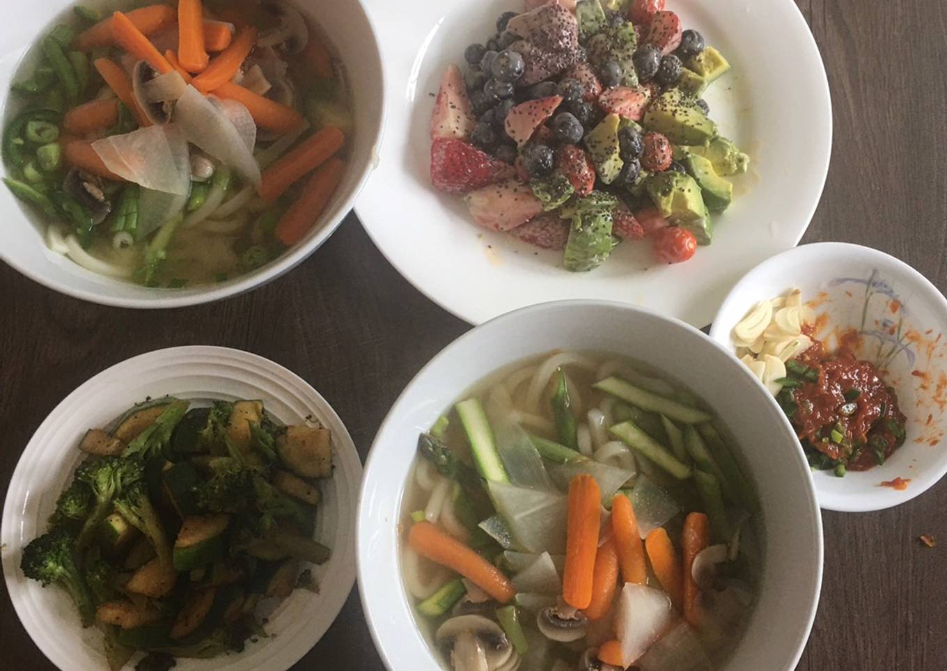 Udon noodle soup w/ side dishes of zucchini & fruit