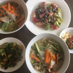 Udon noodle soup w/ side dishes of zucchini & fruit A picture of Udon noodle soup w/ side dishes of zucchini & fruit.
