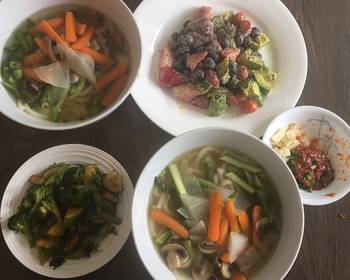 Fast Cooking Methods Udon noodle soup w side dishes of zucchini  fruit Very Delicious