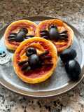 Spooky Mini Pizzas with Olive Spiders