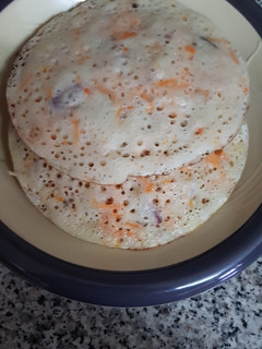A picture of Carrot sinasir(rice and carrot pancake).