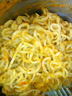 A picture of Indomie with Pumpkin Seed Gravy.