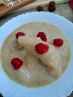 দুধ পুলি পিঠে (dudh puli pithe recipe in Bengali) রেসিপির প্রধান ছবি