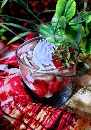 A picture of Strawberry with chocolate dessert.