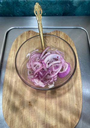 A picture of Mild Pickled Red Onions with Coarse Salt and Ground Pepper.