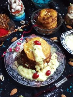 মালপোয়া রাবড়ি (Malpoa rabri recipe in bengali) রেসিপির প্রধান ছবি
