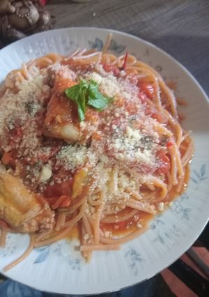 Una foto de Fideo de arroz con tuco de pollo