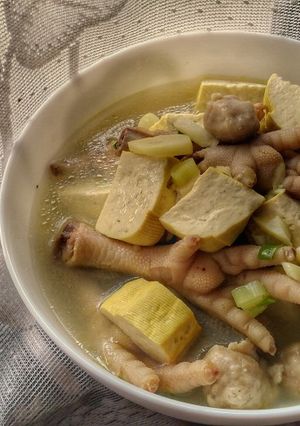 A picture of Chicken Feet Meatballs and Tofu Soup.