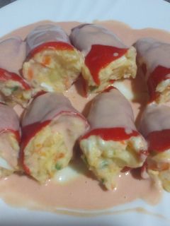 Una foto de Pimientos de piquillo rellenos de ensaladilla