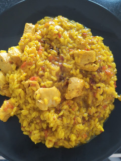 Una foto de Arroz meloso con pollo