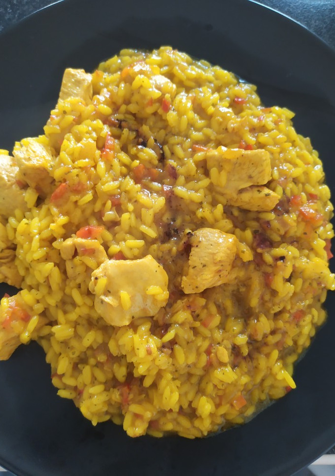 Una foto de Arroz meloso con pollo