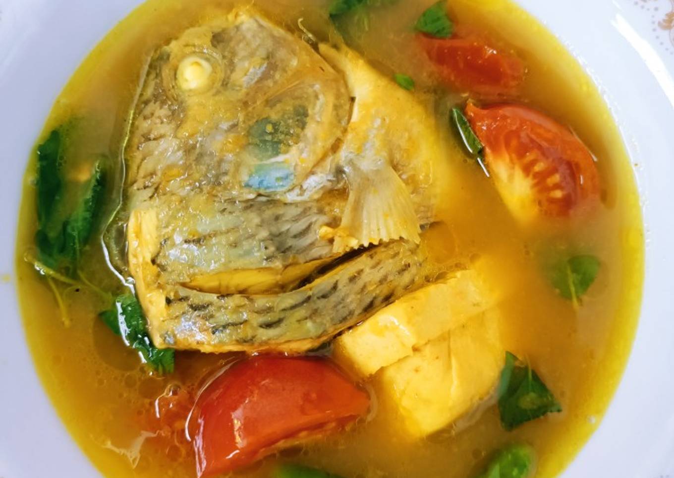 Asem asem ikan nila kemangi