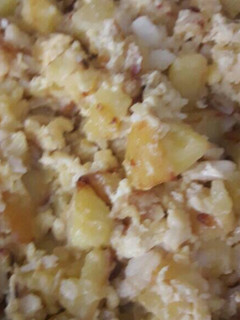 Una foto de Revuelto de bacalao y patata
