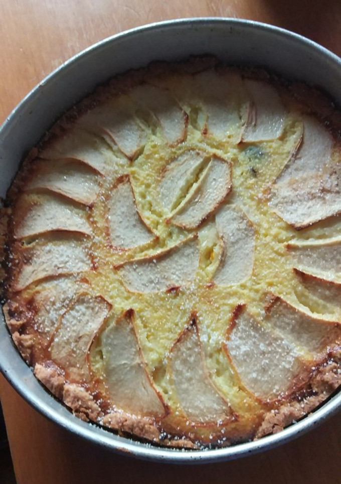 Una foto de Tarta de ricotta, pasas y manzanas
