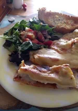 Una foto de Canelones de pollo con champiñones