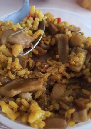 Una foto de Arroz con calamar y gambas