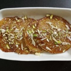 A picture of Traditional Dryfruits Malpua.