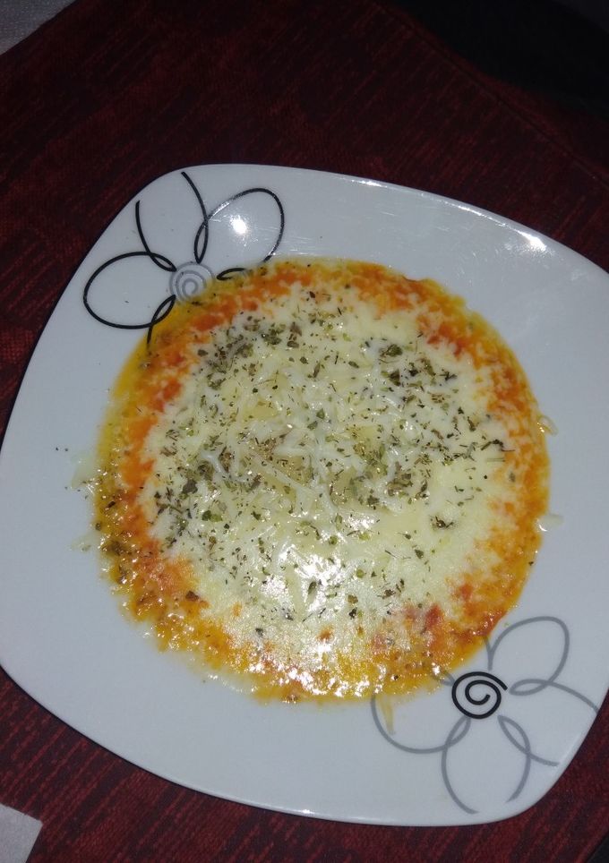 Una foto de Tapa de queso fundido para comer con pan