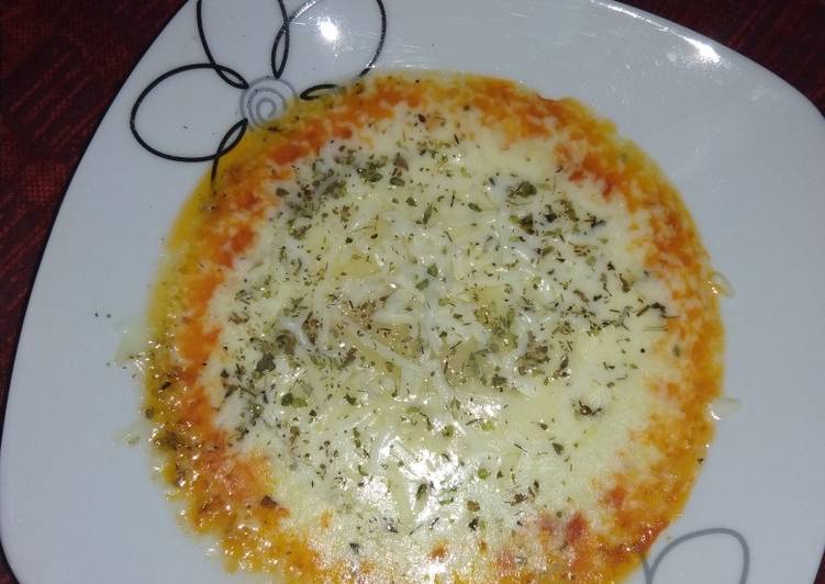 Tapa de queso fundido para comer con pan