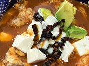 Una foto de sopa de tortillas