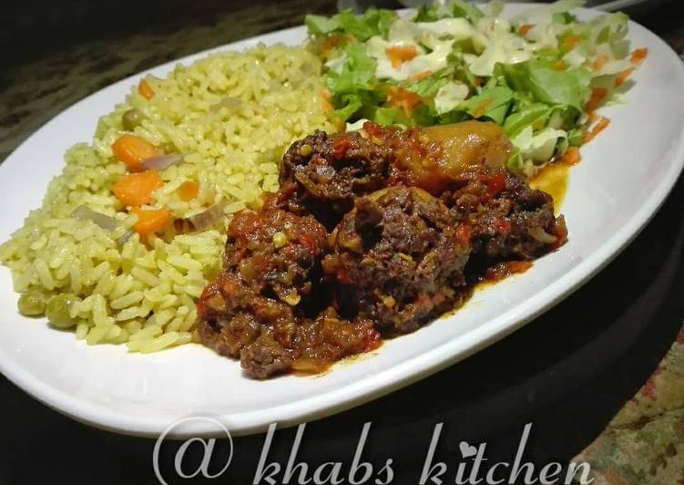 Fried rice with meat ball sauce and salad