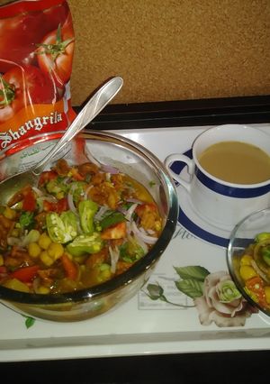 A picture of Kathiyawari cholay with tea.