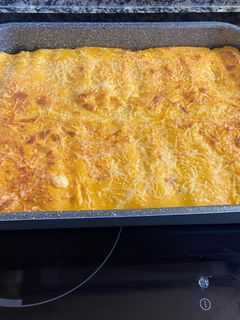 Una foto de Canelones con una bechamel especial